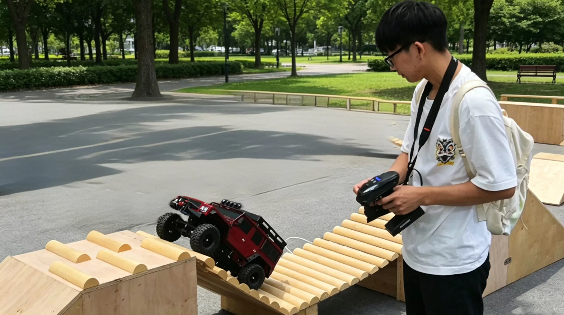 beginner-happily-driving-an-rtr-rc-car-in-a-park.jpg